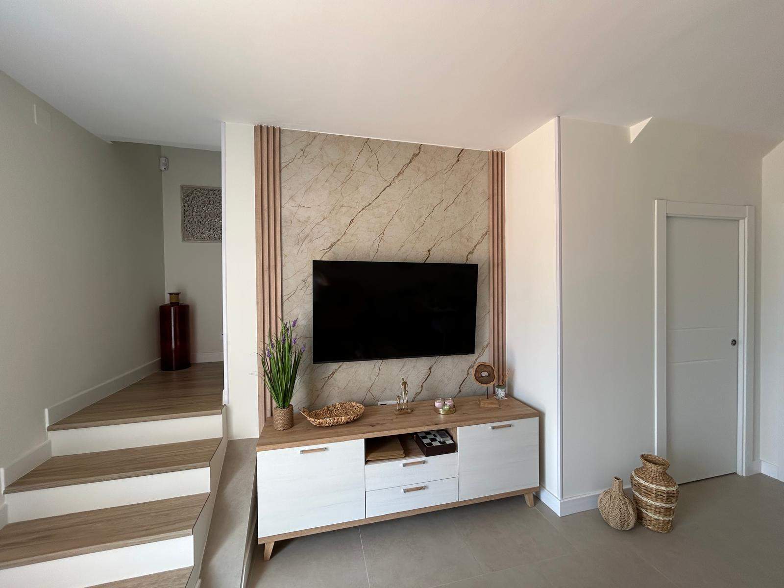 Salón reformado en vivienda de Vera